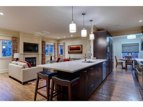 921 Riverdale Avenue Sw, Calgary, AB - Indoor With Fireplace