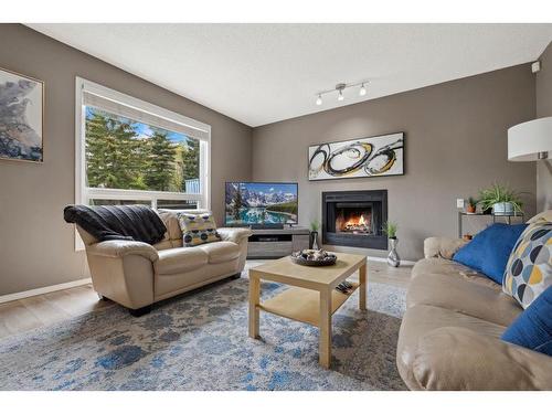 2139 Sirocco Drive Sw, Calgary, AB - Indoor Photo Showing Living Room With Fireplace