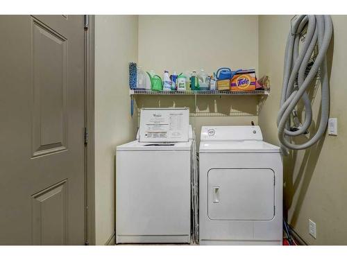 63 Evansmeade Common Nw, Calgary, AB - Indoor Photo Showing Laundry Room