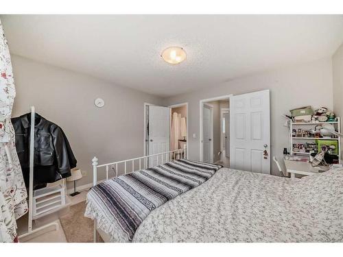 109 Cougar Plateau Mews Sw, Calgary, AB - Indoor Photo Showing Bedroom