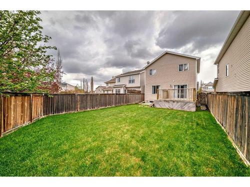 109 Cougar Plateau Mews Sw, Calgary, AB - Outdoor With Backyard With Exterior