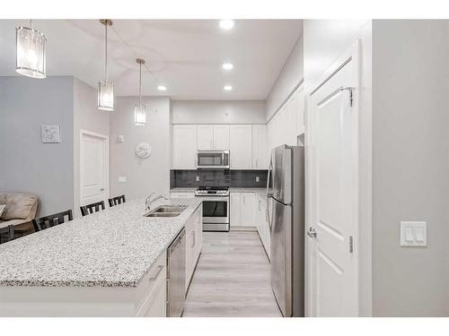 410-20 Mahogany Mews Se, Calgary, AB - Indoor Photo Showing Kitchen With Stainless Steel Kitchen With Double Sink With Upgraded Kitchen