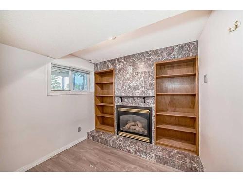 6764 Temple Drive Ne, Calgary, AB - Indoor With Fireplace