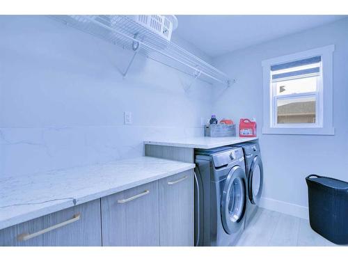 132 Belvedere Drive Se, Calgary, AB - Indoor Photo Showing Laundry Room