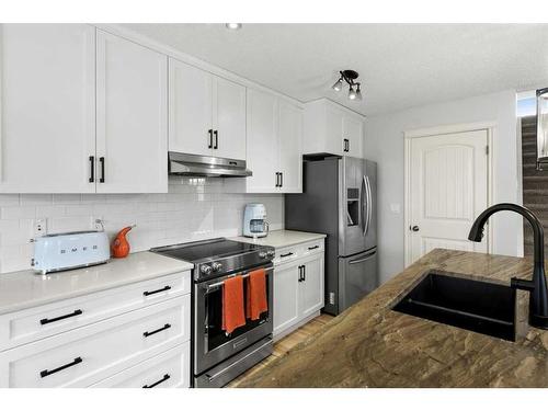 118 Auburn Glen Drive Se, Calgary, AB - Indoor Photo Showing Kitchen With Double Sink With Upgraded Kitchen