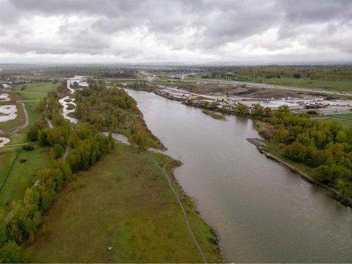 306-221 Quarry Way Se, Calgary, AB - Outdoor With Body Of Water With View