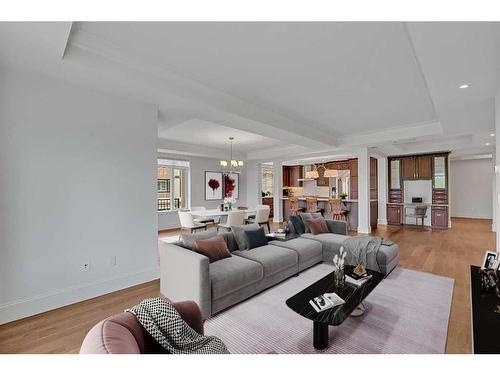 306-221 Quarry Way Se, Calgary, AB - Indoor Photo Showing Living Room