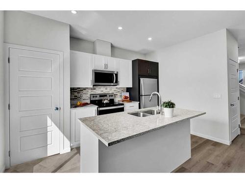 254 Aquila Way Nw, Calgary, AB - Indoor Photo Showing Kitchen With Stainless Steel Kitchen With Double Sink With Upgraded Kitchen