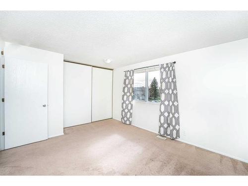 379 Falshire Way Ne, Calgary, AB - Indoor Photo Showing Other Room