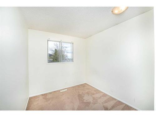 379 Falshire Way Ne, Calgary, AB - Indoor Photo Showing Other Room