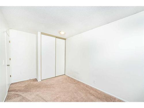 379 Falshire Way Ne, Calgary, AB - Indoor Photo Showing Other Room