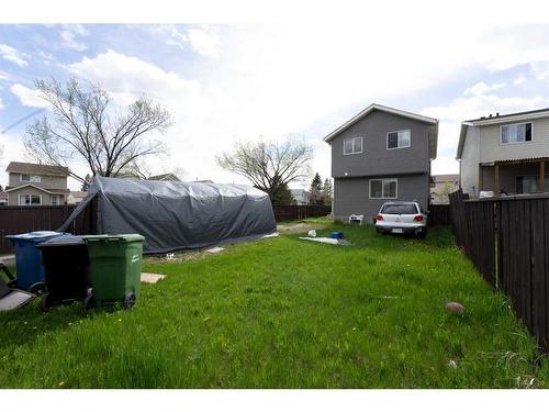 379 Falshire Way Ne, Calgary, AB - Outdoor With Backyard