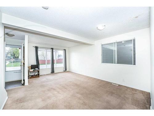 379 Falshire Way Ne, Calgary, AB - Indoor Photo Showing Other Room