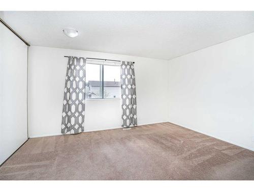 379 Falshire Way Ne, Calgary, AB - Indoor Photo Showing Other Room