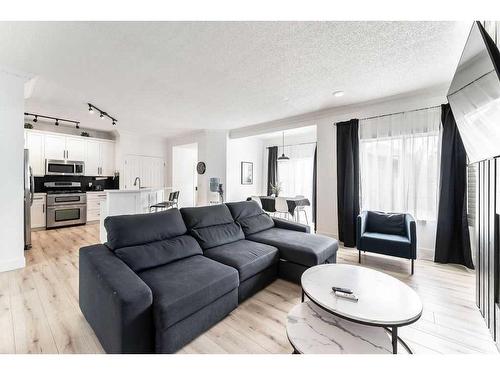 18372 Chaparral Street Se, Calgary, AB - Indoor Photo Showing Living Room