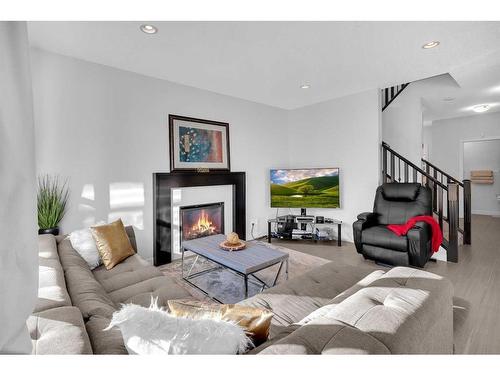 14 Sage Meadows Way Nw, Calgary, AB - Indoor Photo Showing Living Room With Fireplace
