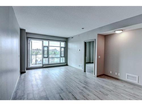 609-210 15 Avenue Se, Calgary, AB - Indoor Photo Showing Other Room