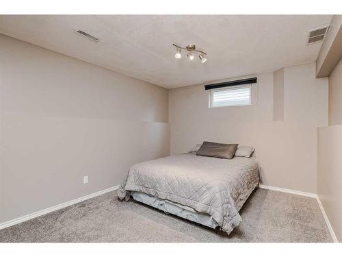 234 Bridlewood Road Sw, Calgary, AB - Indoor Photo Showing Bedroom