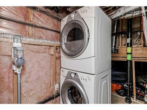 234 Bridlewood Road Sw, Calgary, AB - Indoor Photo Showing Laundry Room