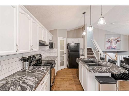 234 Bridlewood Road Sw, Calgary, AB - Indoor Photo Showing Kitchen With Double Sink With Upgraded Kitchen