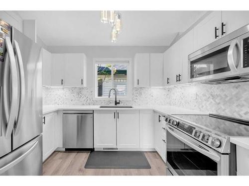 218 Coverdale Road Ne, Calgary, AB - Indoor Photo Showing Kitchen With Upgraded Kitchen