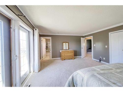 302 Silverthorn Close, Olds, AB - Indoor Photo Showing Bedroom