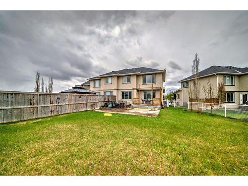 250 Evansmeade Point Nw, Calgary, AB - Outdoor With Backyard With Exterior