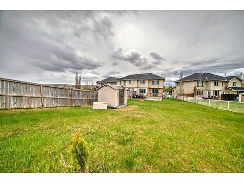 250 Evansmeade Point Nw, Calgary, AB - Outdoor With Backyard