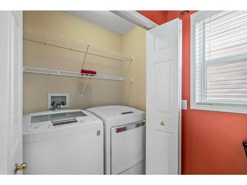 55 Crystalridge Crescent, Okotoks, AB - Indoor Photo Showing Laundry Room