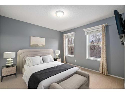 55 Crystalridge Crescent, Okotoks, AB - Indoor Photo Showing Bedroom
