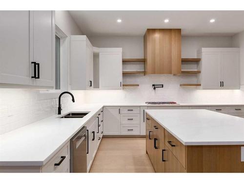 27 Rockford Park Nw, Calgary, AB - Indoor Photo Showing Kitchen With Double Sink With Upgraded Kitchen