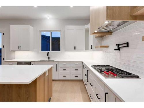 27 Rockford Park Nw, Calgary, AB - Indoor Photo Showing Kitchen With Upgraded Kitchen