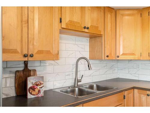 119 Cedargrove Court Sw, Calgary, AB - Indoor Photo Showing Kitchen With Double Sink