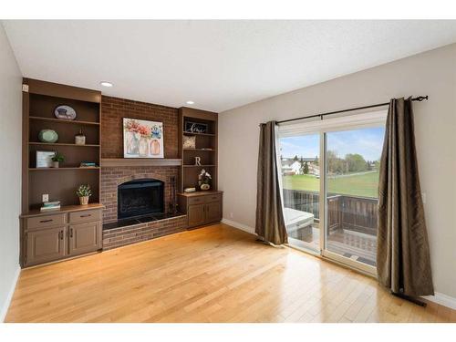 119 Cedargrove Court Sw, Calgary, AB - Indoor Photo Showing Living Room With Fireplace