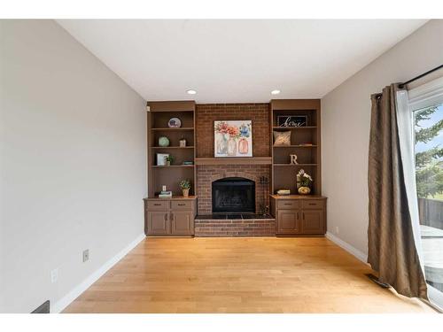 119 Cedargrove Court Sw, Calgary, AB - Indoor With Fireplace