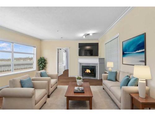 359-333 Riverfront Avenue Se, Calgary, AB - Indoor Photo Showing Living Room With Fireplace