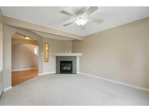 262 Cougarstone Circle Sw, Calgary, AB - Indoor With Fireplace