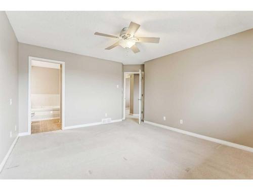 262 Cougarstone Circle Sw, Calgary, AB - Indoor Photo Showing Other Room