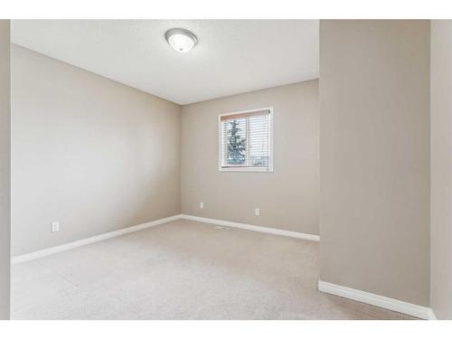 262 Cougarstone Circle Sw, Calgary, AB - Indoor Photo Showing Other Room