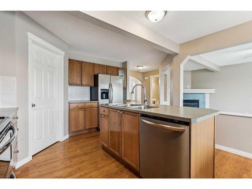 262 Cougarstone Circle Sw, Calgary, AB - Indoor Photo Showing Kitchen With Double Sink