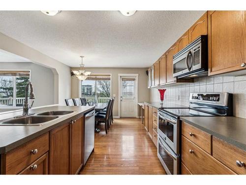 262 Cougarstone Circle Sw, Calgary, AB - Indoor Photo Showing Kitchen With Double Sink