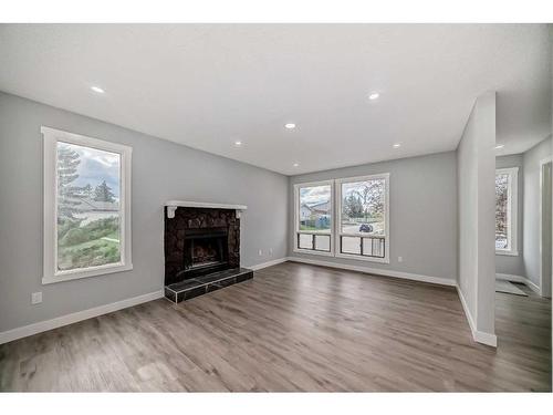 55 Templemont Drive Ne, Calgary, AB - Indoor Photo Showing Living Room With Fireplace