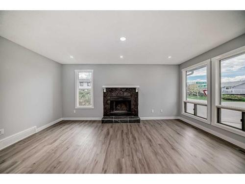 55 Templemont Drive Ne, Calgary, AB - Indoor Photo Showing Living Room With Fireplace
