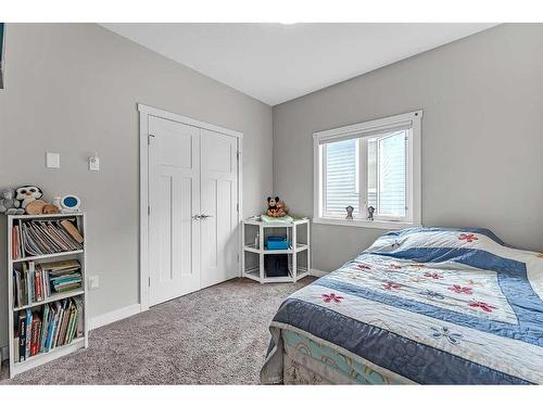 524 Harrison Court, Crossfield, AB - Indoor Photo Showing Bedroom