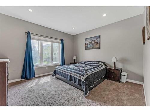 524 Harrison Court, Crossfield, AB - Indoor Photo Showing Bedroom