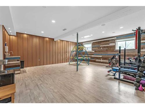 524 Harrison Court, Crossfield, AB - Indoor Photo Showing Gym Room
