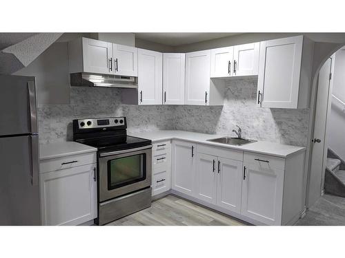 35 Falshire Way Ne, Calgary, AB - Indoor Photo Showing Kitchen With Upgraded Kitchen