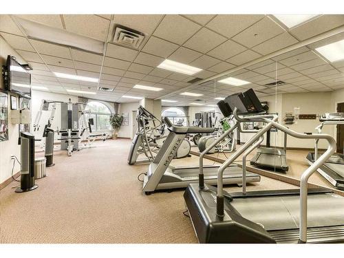107-1726 14 Avenue Nw, Calgary, AB - Indoor Photo Showing Gym Room