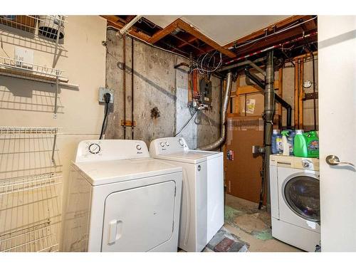 211 Marlyn Place Ne, Calgary, AB - Indoor Photo Showing Laundry Room
