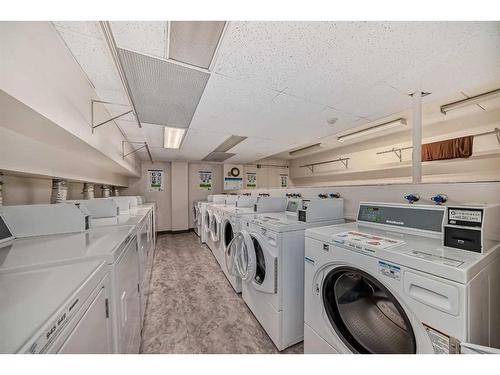 610-5204 Dalton Drive Nw, Calgary, AB - Indoor Photo Showing Laundry Room